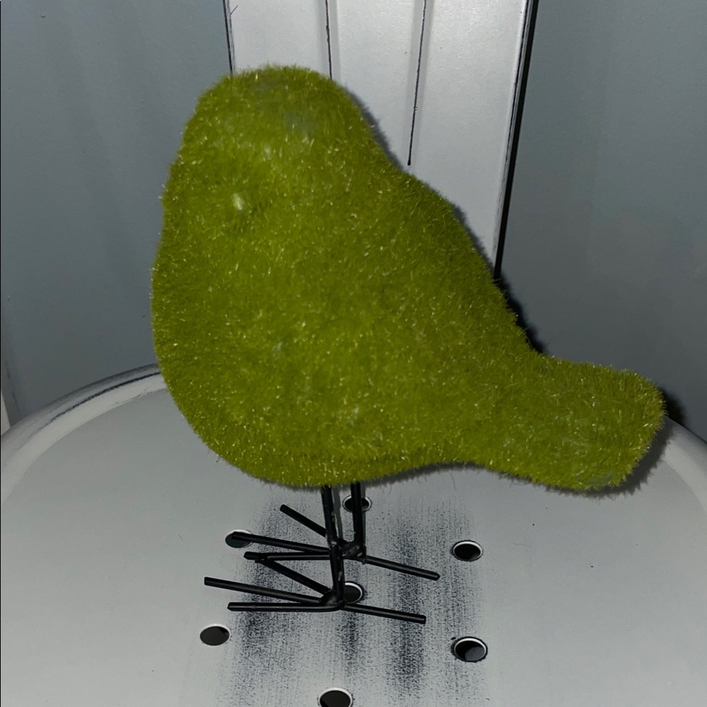 Spring Moss covered bird with metal legs.